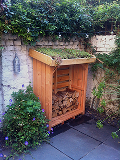 Log store with planter roof.jpg