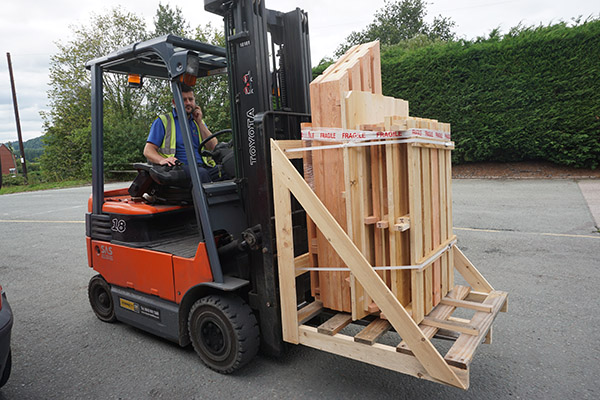 Style A Log Store being delivered