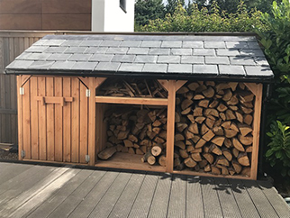 Log store with slate roof.JPG